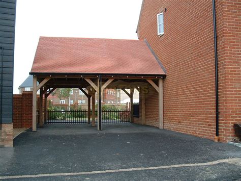 Whether you're looking to build a porch the uprights of our kits are 215mm, to match that of a standard brick size, ensuring the build is easier without custom bricks and. Timber Garages : Beamlock post & beam double timber carports