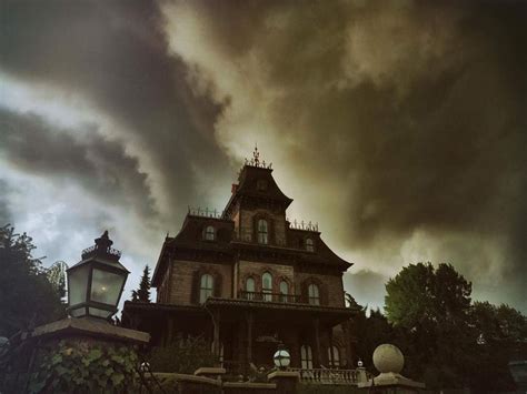 Stormy Clouds Above Phantom Manor Haunted House In Frontierland