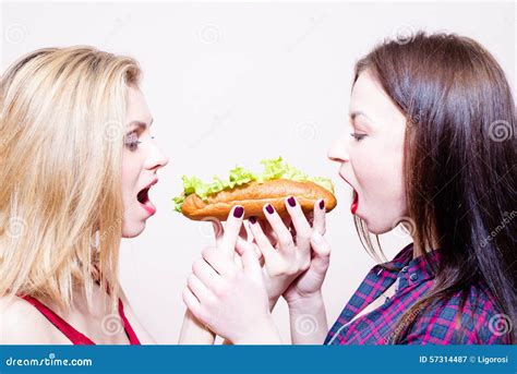Picture Of 2 Hungry Beautiful Girls Having Fun Stock Image Image Of