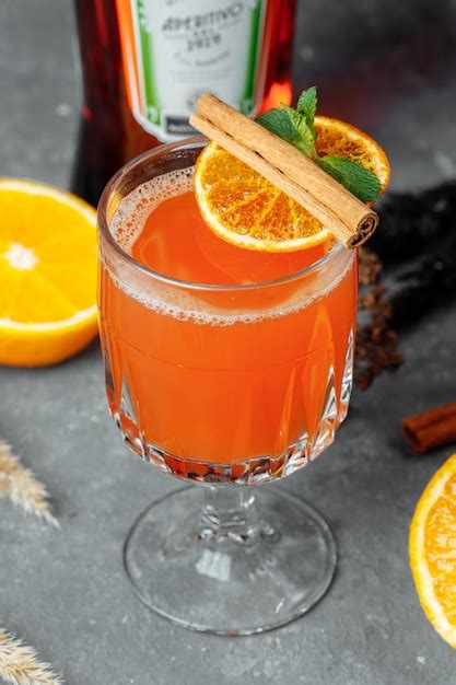 Premium Photo Warming Winter Cocktail With Aperol Hot Aperol Cocktail For New Years And
