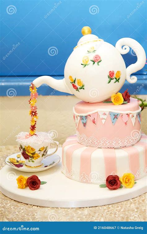 Teapot Celebration Cake Three Tiered With Teapot Pouring Sugar Flowers
