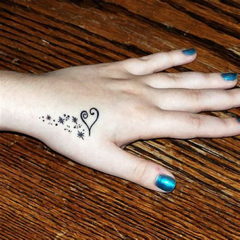 They can be big and bold. Hand Tattoos for Women | Tattoo Ideas Mag