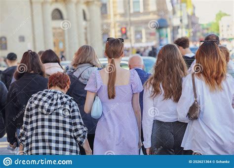 People Walk Down The Street In The City During Stock Photo Image Of