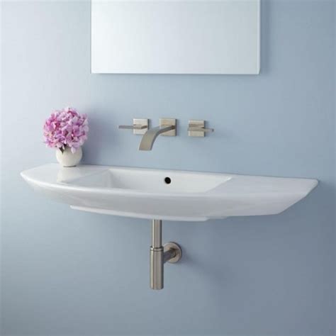 The oval shape, with its traditional styling, is ideal for small bathrooms where space is limited; 17 Captivating Mini Sink Designs For Small Bathrooms