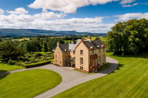 A Spectacularly Renovated Baronial Home Set In Lush Grounds In Scotland