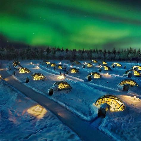 travel earth vacations on instagram “under the northern lights in a glass igloo at the
