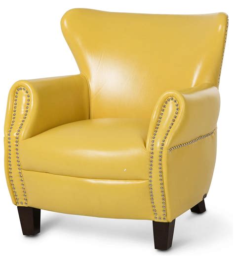 A Yellow Leather Chair With Studded Trimmings On The Arms And Back Legs