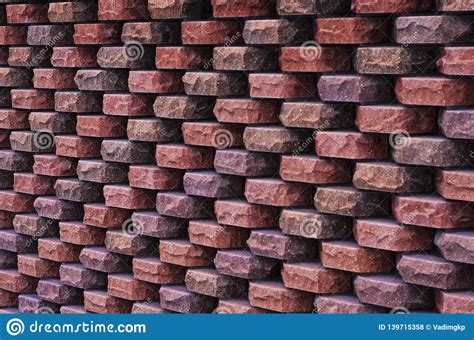 Beautiful Decorative Wall Of Torn Brick Stock Photo