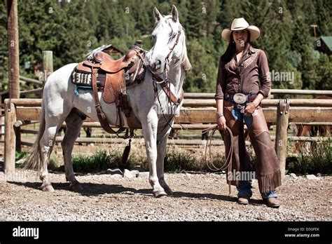 Cowgirl Wrangler With Horse Ranching Montana Usa Stock Photo Alamy