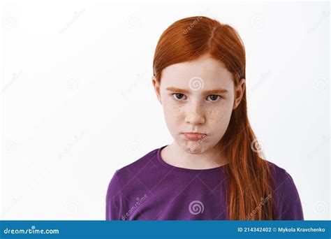 Close Up Of Sad Redhead Girl With Freckles Sulking Angry Or Gloomy