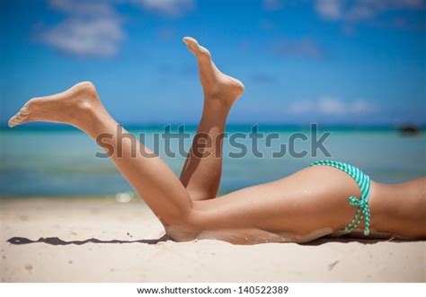 Womens Beautiful Legs On Beach Stock Photo Edit Now 140522389