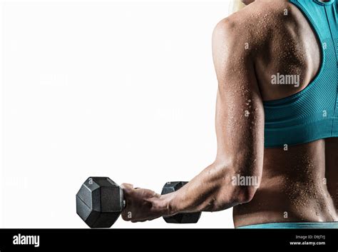 Young Woman Performing Bicep Curls Close Up Stock Photo Alamy