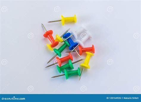 Small Colorful Pins Placed On White Paper Stock Photo Image Of