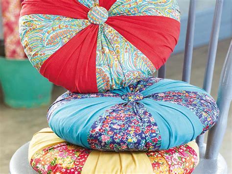 1 1/2 yards of fabric suitable for a pillow cover (cotton works well). Round cushion covers to sew