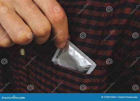 Guy Puts Condom In Front Pocket Contraceptive Stock Photo Image Of
