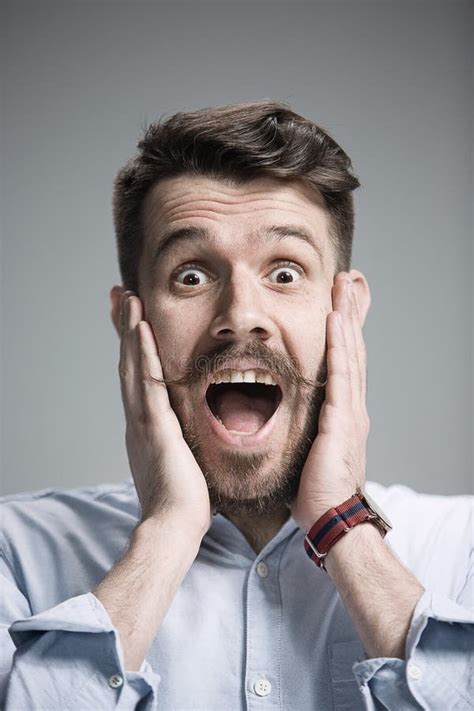 Portrait Of Young Man With Shocked Facial Expression Stock Image