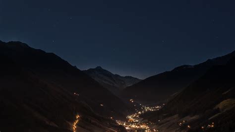 Download 1366x768 Night Village Mountain Lights Scenic