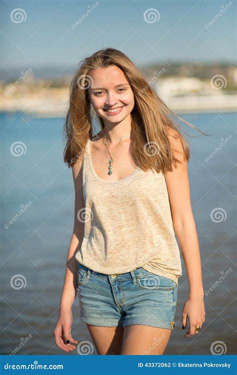 Beautiful Girl On The Beach In Cannes France Stock Photo