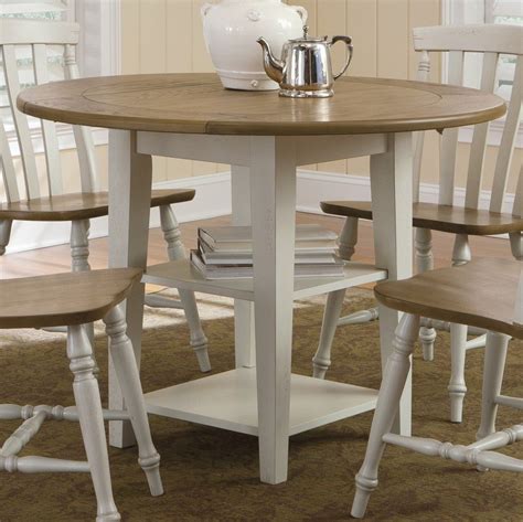 Kaylanne dining set is nicely suited to a dining room, kitchen or living room, where it will perfectly look with other furniture surfaces finished to a high gloss. Round Dining Table Set with Leaf - HomesFeed