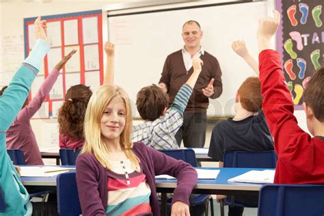 Schüler Die Im Klassenzimmer Mit Lehrer Stock Bild Colourbox