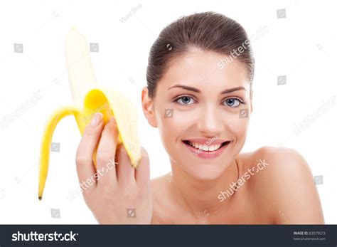 Starving Sexy Woman Holding A Half Peeled Banana In Her Hand Stock
