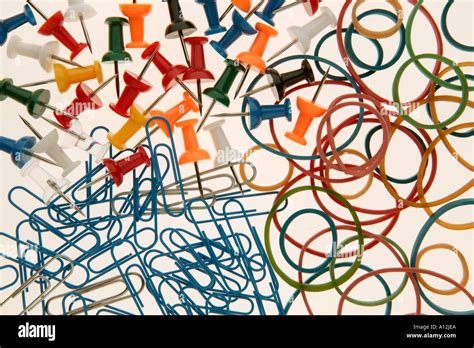 Pins Paper Clips And Rubber Bands On White Background Stock Photo Alamy