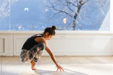 Brunette Woman Doing Yoga Pose By Stocksy Contributor Michela Ravasio Stocksy