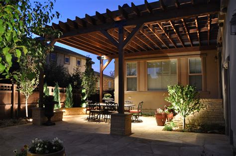 Tuscan Patio And Arbor With Stone Pillars And Lighting Denver Patio