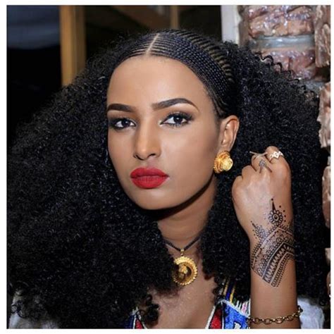 You can wear medium length hairstyles in a number of ways, in a variety of shapes and styles including straight, wavy or curly. Pin by Frewoini on Ethiopian and Eritrean women clothing ...