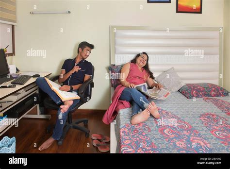 Mother And Son Talking In The Bedroom At Home Stock Photo Alamy