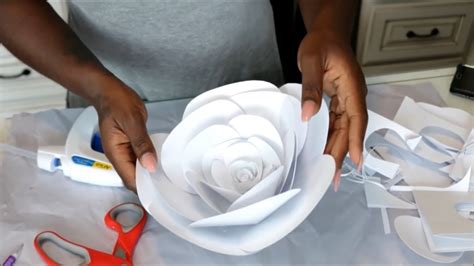 Your giant paper flowers are complete. DIY: LARGE PAPER FLOWER BACKDROP/VIDEO BACKGROUND - YouTube