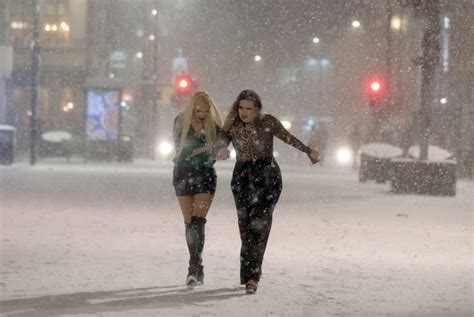 Brave Revellers Trudge Through Snow In Heels As Mini Beast From The