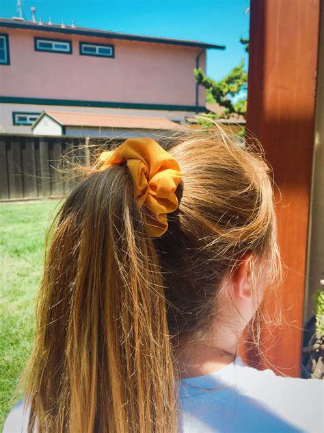 Hairstyle Inspiration High Ponytail Yellow Scrunchie Summer Hair