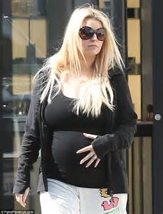 Pregnant Jessica Simpson Tenderly Cradles Her Huge Bump As She Hits The