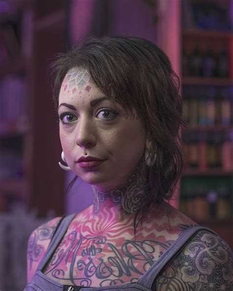 striking photos of inked individuals who proudly don face tattoos huffpost us
