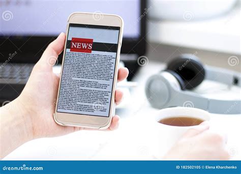 Online News On A Mobile Phone Close Up Of Businesswoman Reading News Or Articles In A
