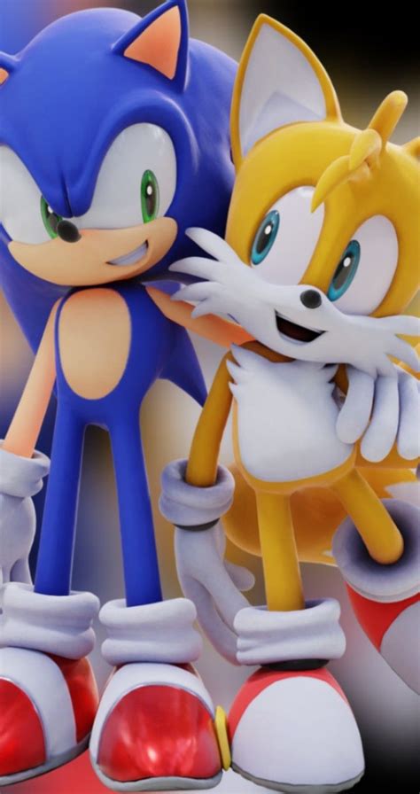 Two Sonic And Tails Figurines Standing Next To Each Other