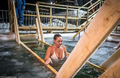 Brave Orthodox Christians Plunge Into Icy Water For Epiphany