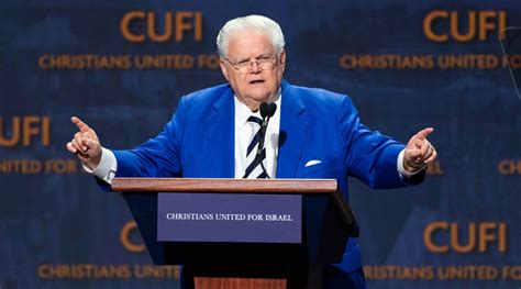 Photo Of Pastor John Hagee Dressed In A Bright Blue Sports Jacket And