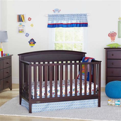 Foldable bed rail with wooden pattern for toddlers. Graco Benton 4-in-1 Convertible Crib - Easily Converts to ...