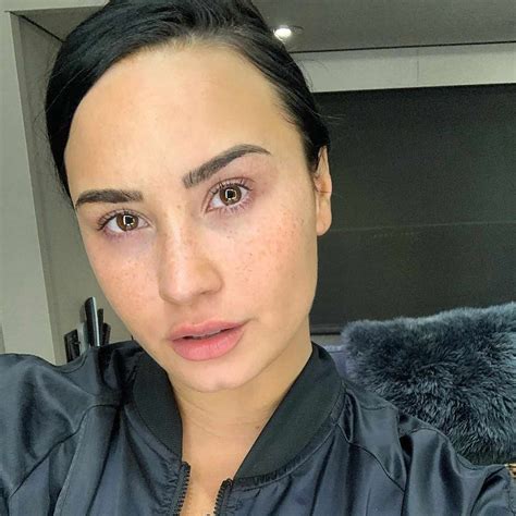demi lovato goes all natural and shows off her freckles on the cover of harper s bazaar