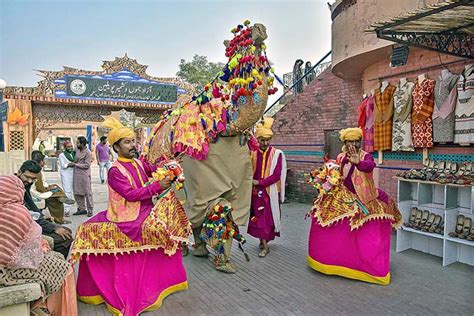 Artists Performing Traditional Dance During Folk Festival Lok Mela At