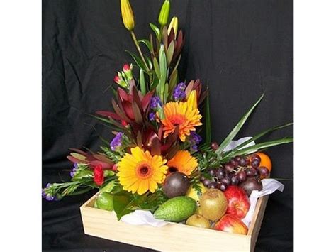 At giftbasketcanada we are proud to offer fresh quality. Fruit & Flowers Gift Basket - Ilam Florist