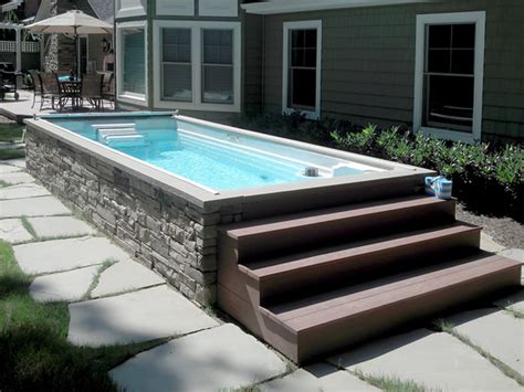 There's nothing like cooling off in a beautiful swimming pool on the hot days of summer. Patio Rectangular Concrete Inground Pool These Above ...