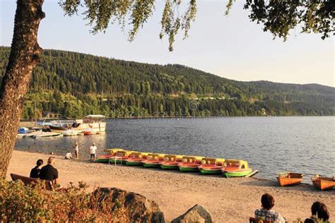 Black Forest Lake Titisee Beach With Rental Boats And Tourists