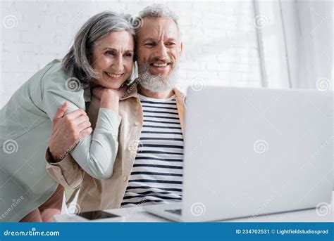 Positive Mature Woman Hugging Husband And Stock Image Image Of