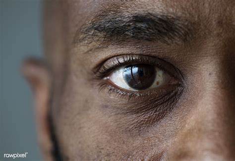 Download Premium Image Of Closeup Of An Eye Of A Black Man 383760