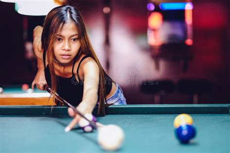 Young Beautiful Girl Playing Billiard In A Club Stock Photo Image Of