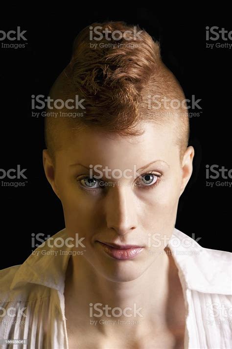 Punk Redhead Woman With Mohawk Shaved Hairs And Green Eyes Stok