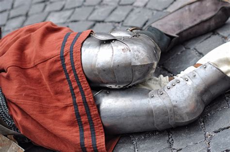 Medieval Warrior Lying Dead On The Ground Stock Photo Download Image